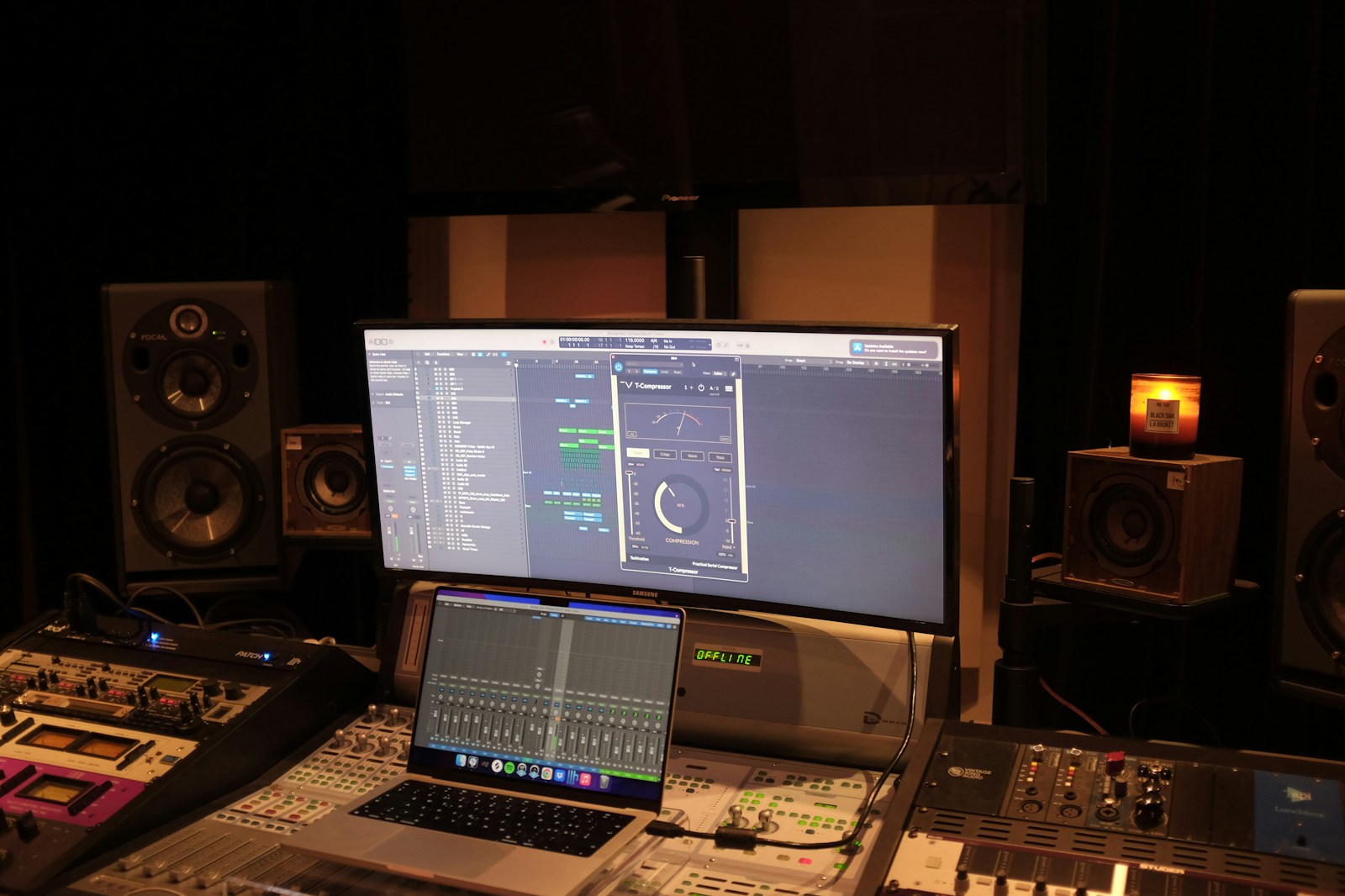 Close up of a cheap studio monitor woofer with distorted cone and poor cabinet resonance