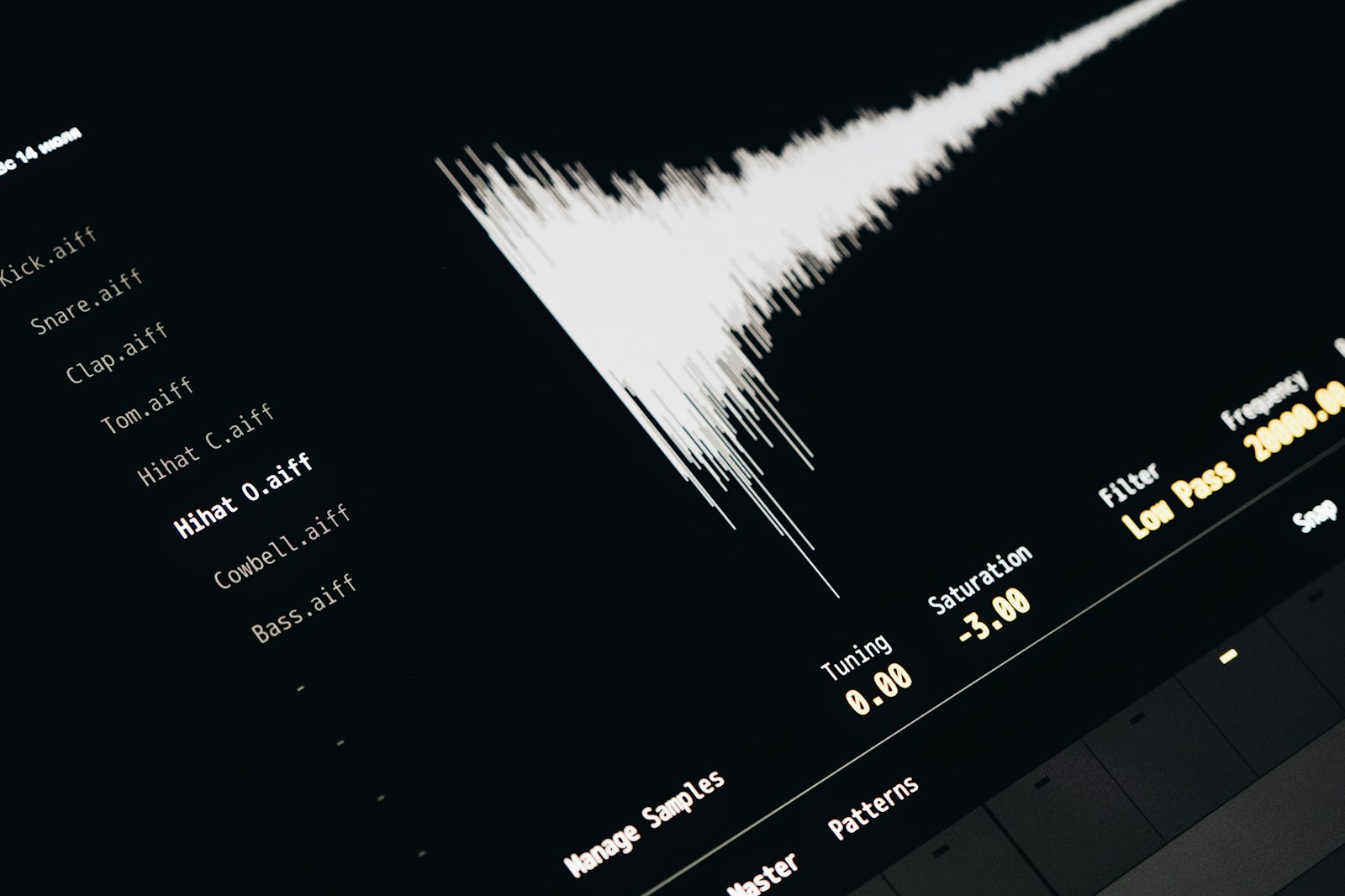 Close-up view of a digital audio workstation screen showing multiple audio tracks and waveform editing
