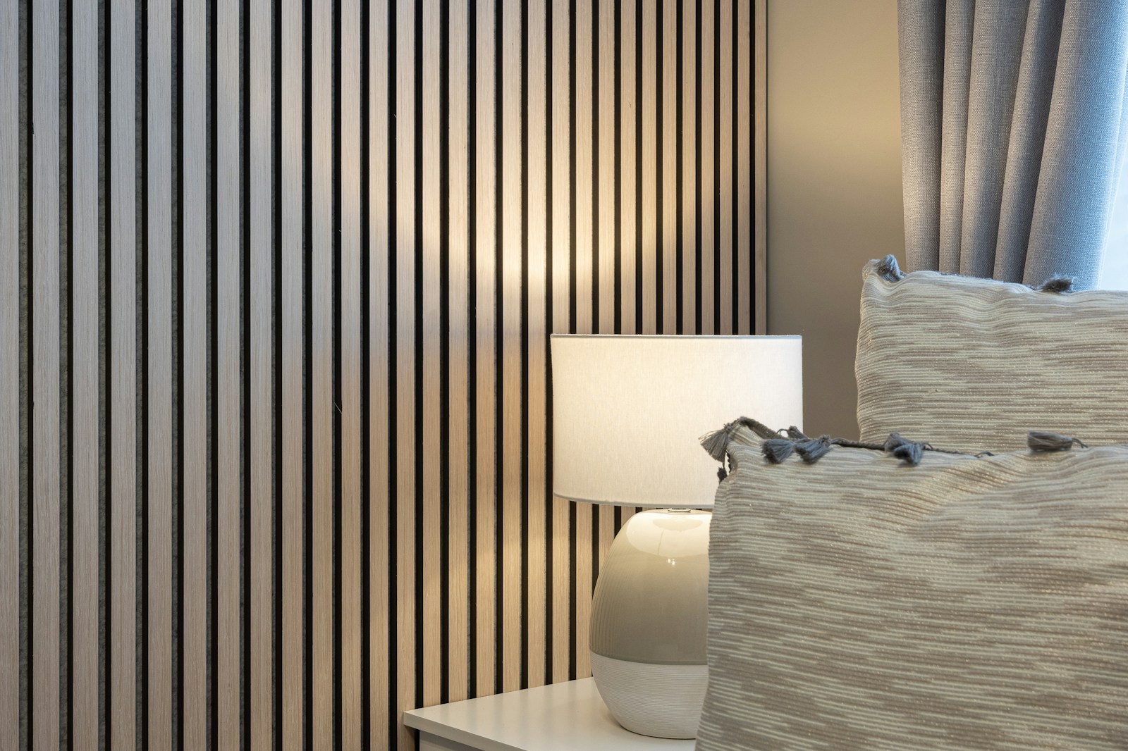 Step-by-step DIY installation of acoustic panels for room treatment showing tools and materials