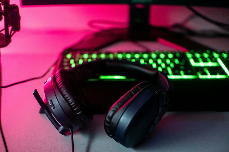 DJ gear including headphones and USB drives on a table for a B2B set