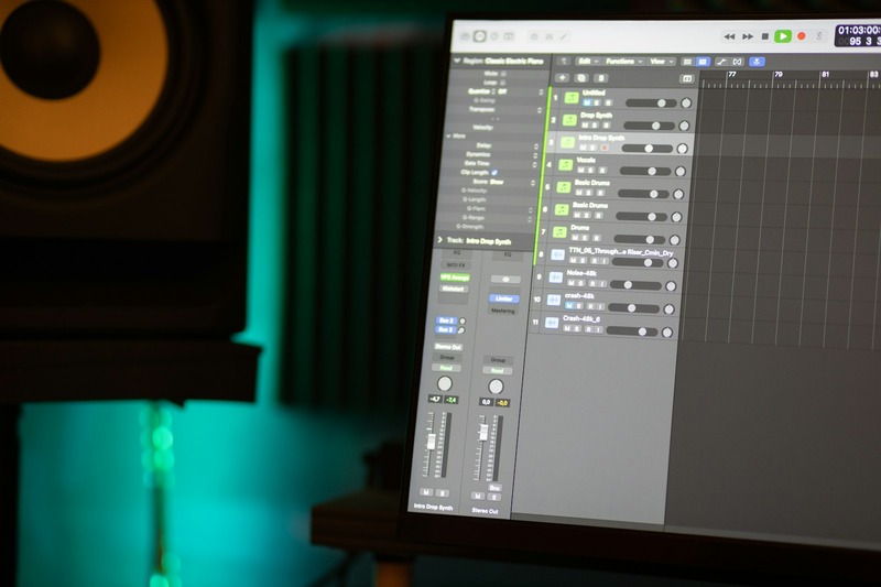 DAW session showing a mastering plugin chain with EQ, compressor, limiter, and metering plugins