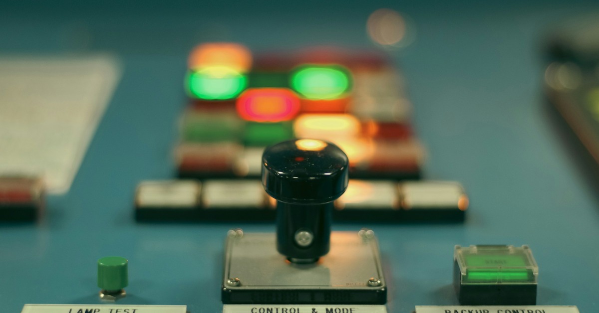 Compact DJ controller placed on an airline tray table during a flight