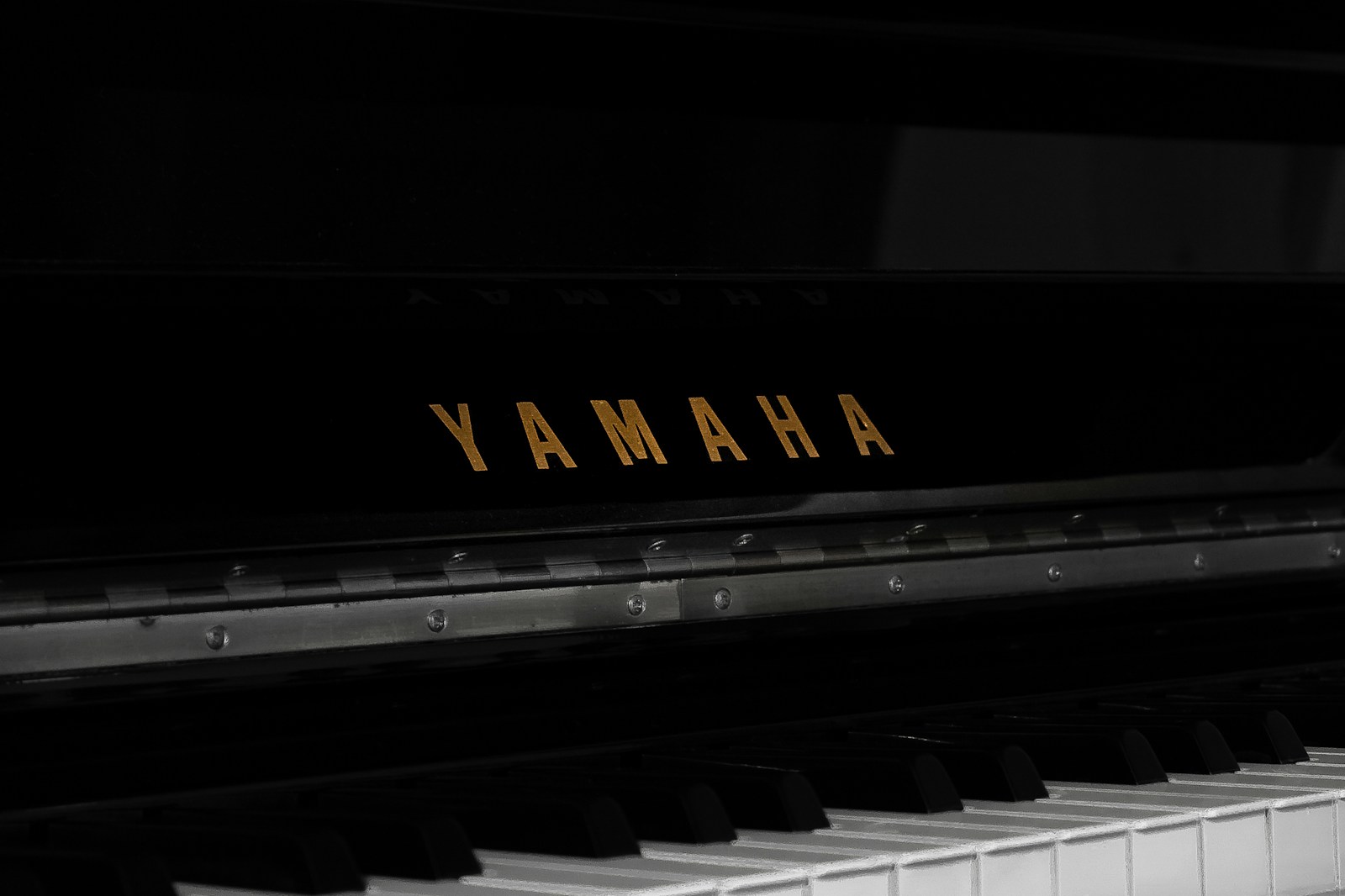 Side by side comparison of a Yamaha HS8 and a KRK Rokit 8 G4 studio monitors in a professional studio.