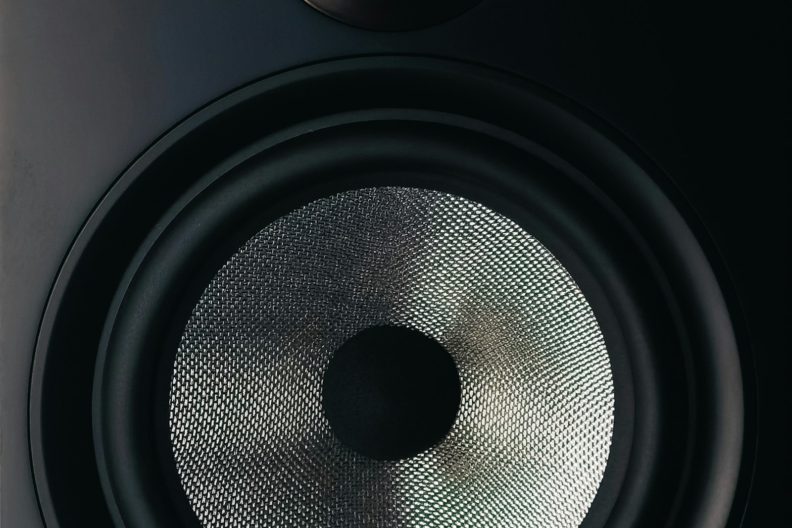 USB-C audio interface on a desktop studio desk with headphones and monitor speakers