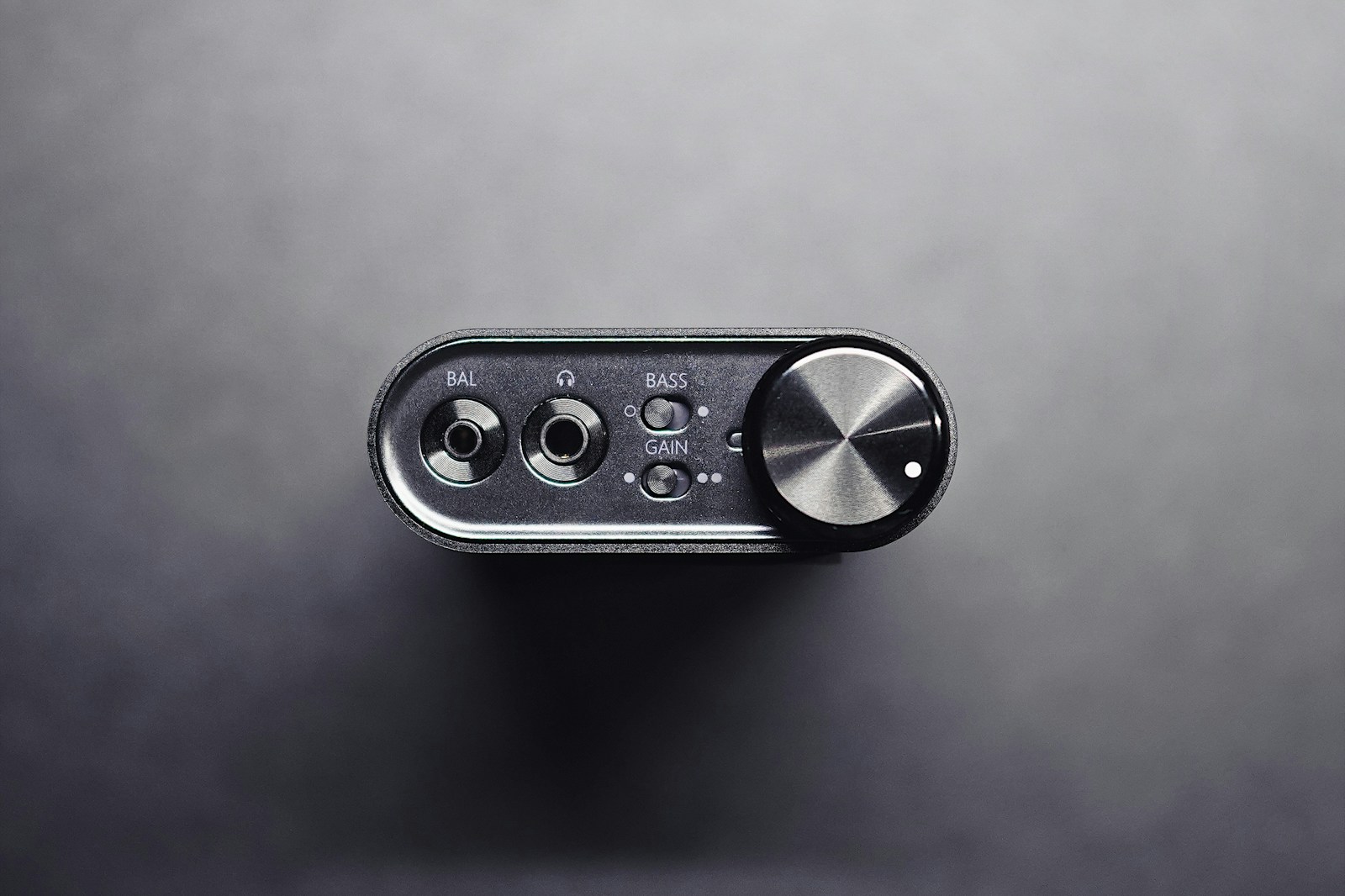USB audio interface and Thunderbolt audio interface placed side by side on a studio desk for comparison
